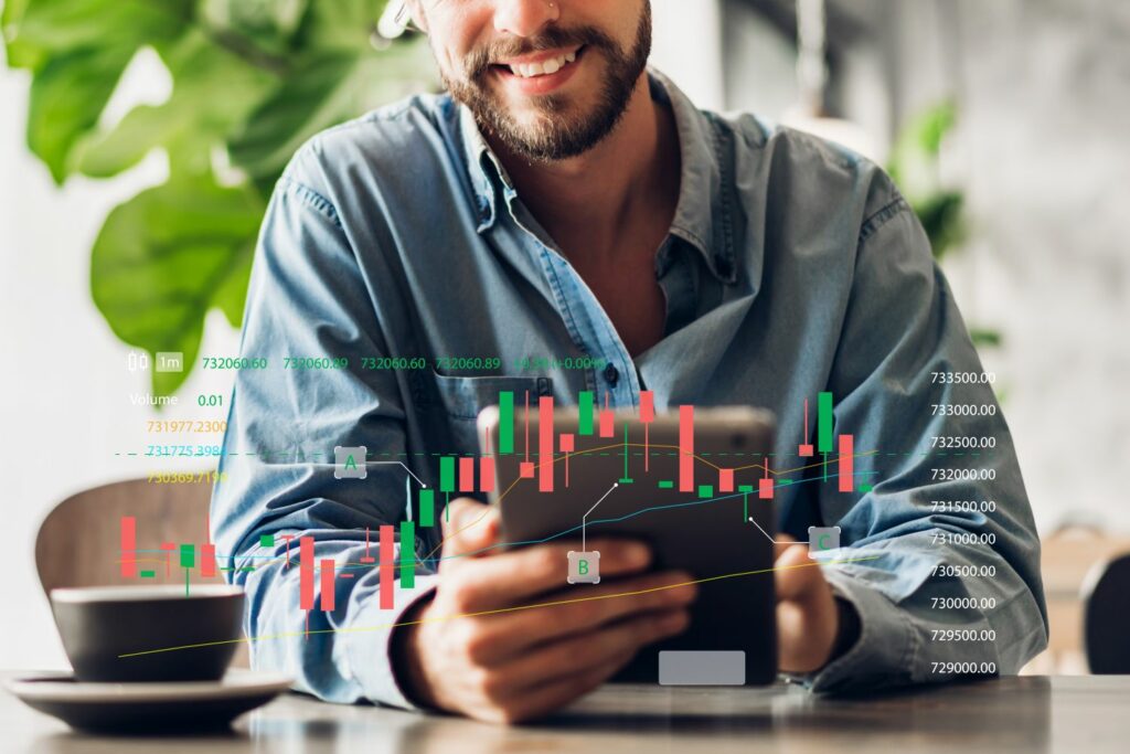 Bitpanda Depot: Mann handelt an der Börse